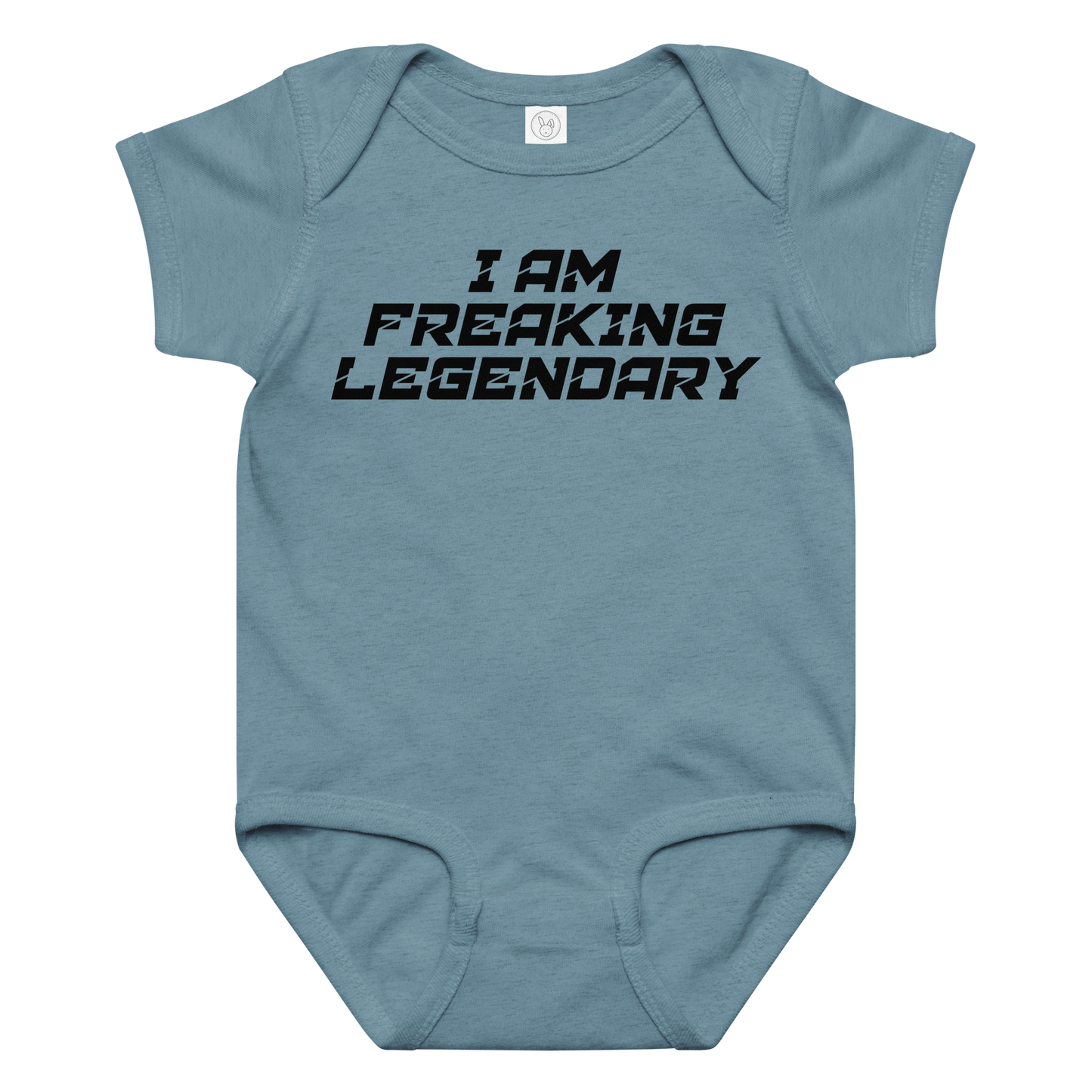"I Am Freaking Legendary" printed on a vintage indigo baby jersey bodysuit laying on a flat surface amongst other clothes