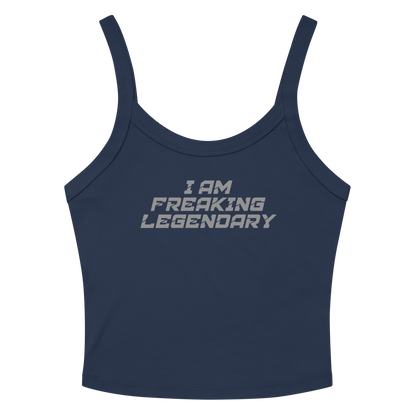 "I Am Freaking Legendary" printed on a solid navy blend women's micro-rib tanktop laying on a flat surface amongst sunglasses and shorts