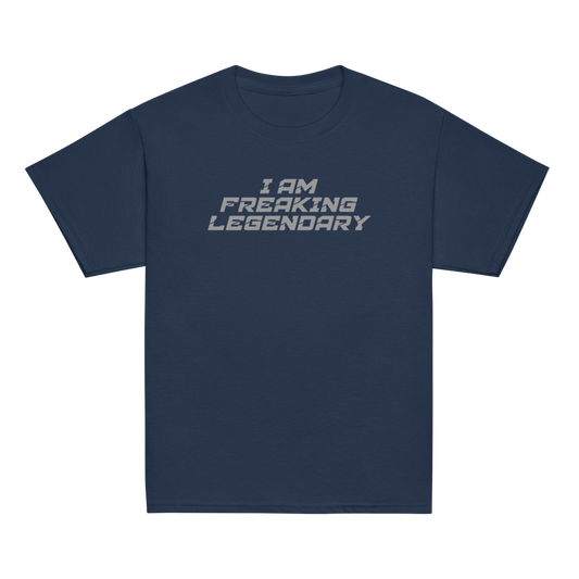 "I Am Freaking Legendary" printed on a navy youth classic tee laying on a flat surface