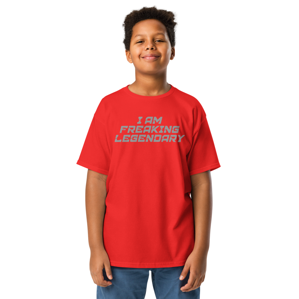 "I Am Freaking Legendary" printed on a red youth classic tee worn by a male