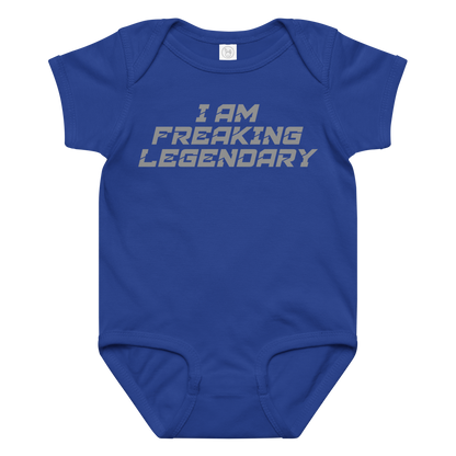 "I Am Freaking Legendary" printed on a royal baby jersey bodysuit laying on a flat surface amongst other clothes