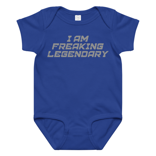 "I Am Freaking Legendary" printed on a royal baby jersey bodysuit laying on a flat surface amongst other clothes