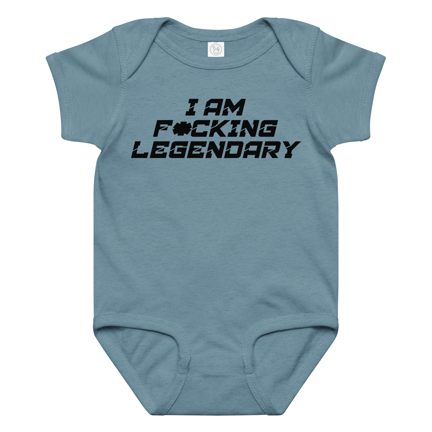 "I Am F*cking Legendary" printed on a vintage indigo baby jersey bodysuit laying on a flat surface amongst other clothes