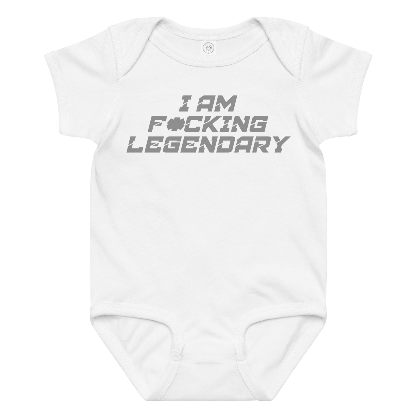 "I Am F*cking Legendary" printed on a white baby jersey bodysuit laying on a flat surface amongst other clothes