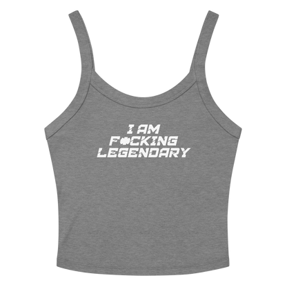 "I Am F*cking Legendary" printed on a athletic heather women's micro-rib tanktop laying on a flat surface amongst sunglasses and shorts