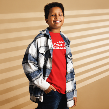 "I Am F*cking Legendary" printed on a red youth classic tee worn by a male also wearing a jacket