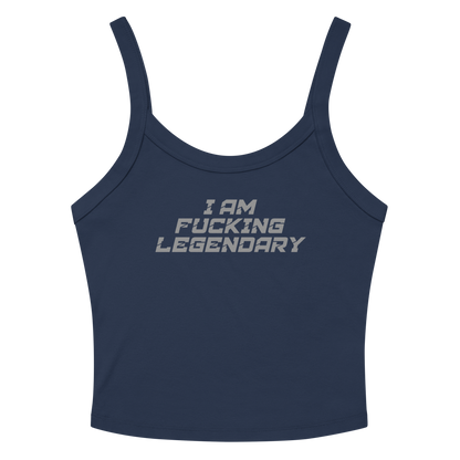 "I Am Fucking Legendary" printed on a solid navy blend women's micro-rib tanktop laying on a flat surface amongst sunglasses and shorts