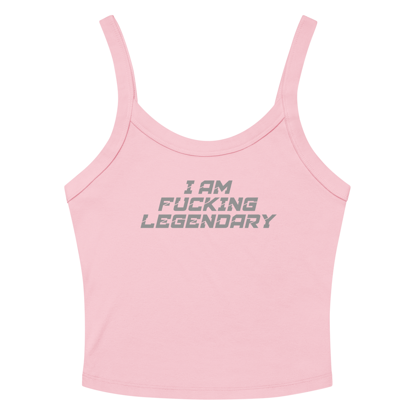 "I Am Fucking Legendary" printed on a solid pink blend women's micro-rib tanktop laying on a flat surface amongst sunglasses and shorts