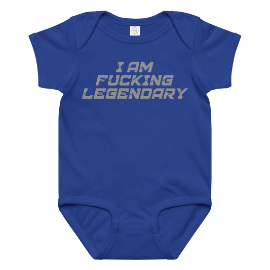 "I Am Fucking Legendary" printed on a royal baby jersey bodysuit laying on a flat surface amongst other clothes
