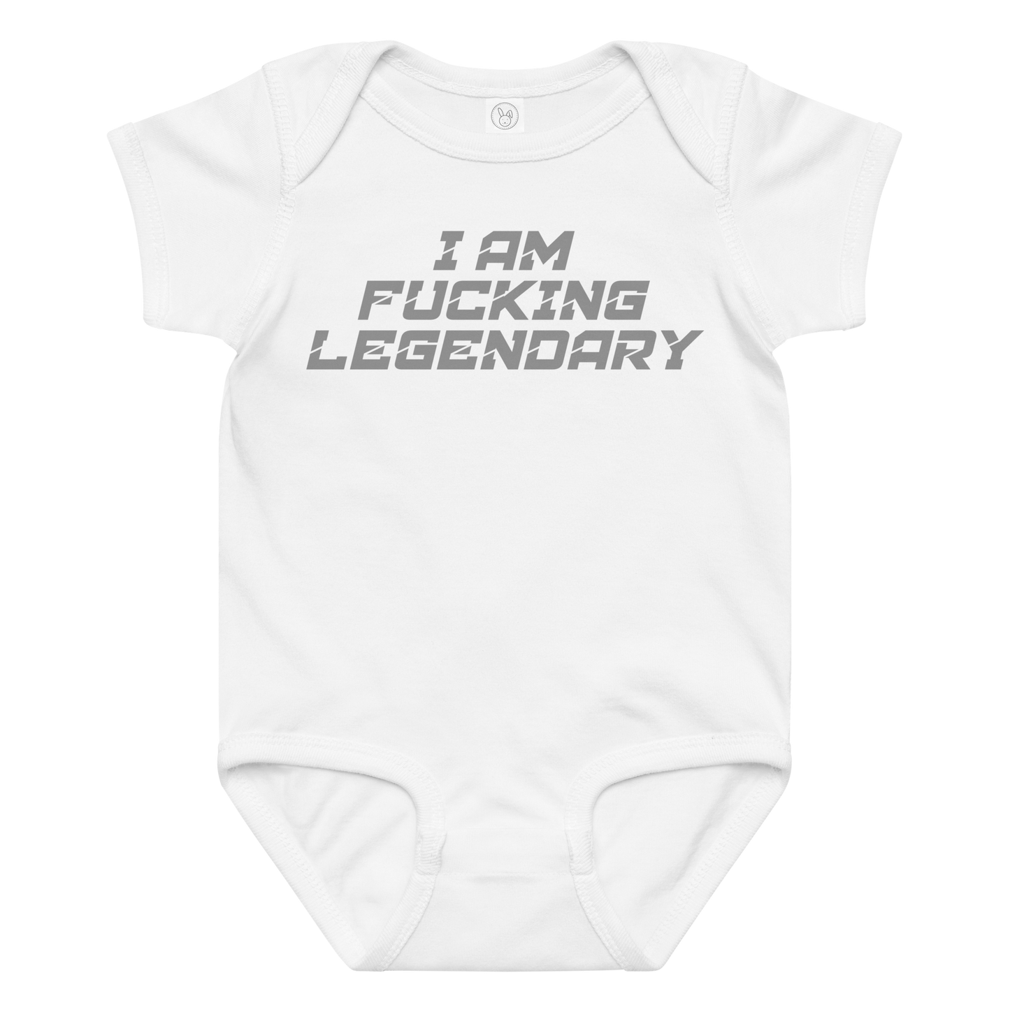 "I Am Fucking Legendary" printed on a white baby jersey bodysuit laying on a flat surface amongst other clothes