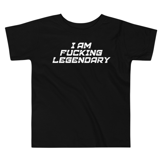 "I Am Fucking Legendary" printed on a black toddler short sleeve tee laying on a flat surface