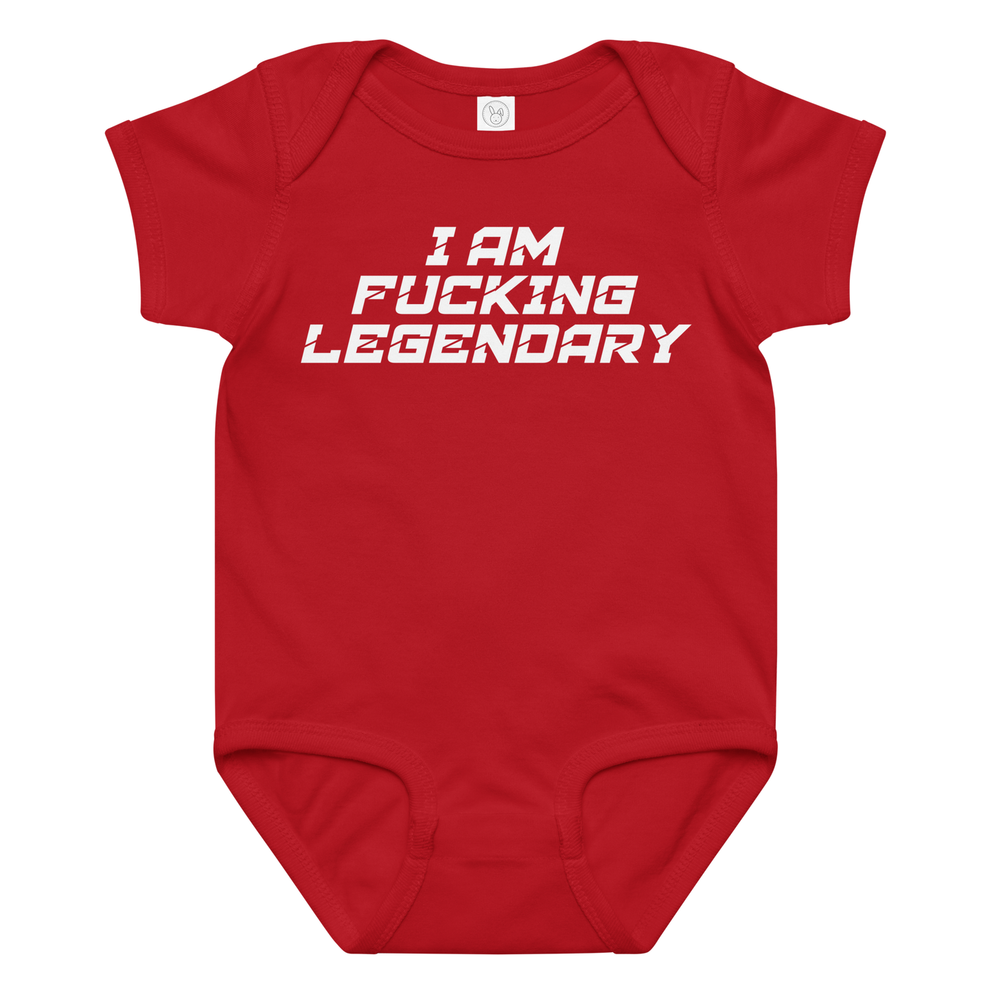 "I Am Fucking Legendary" printed on a red baby jersey bodysuit laying on a flat surface amongst other clothes