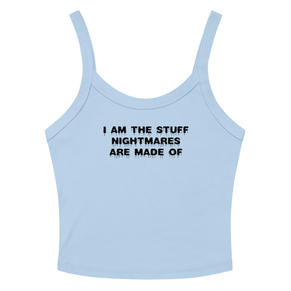 "I am the stuff nightmares are made of" printed on a solid baby blue blend women's micro-rib tanktop laying on a flat surface amongst sunglasses and shorts