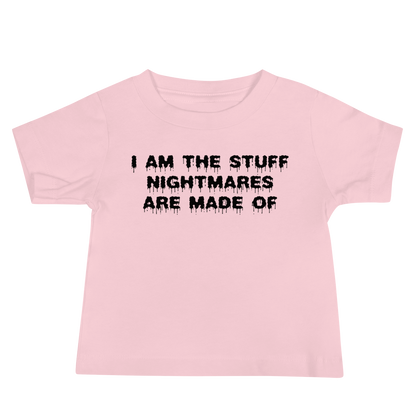 "I am the stuff nightmares are made of" printed on a pink baby jersey short sleeve tee laying on a flat surface