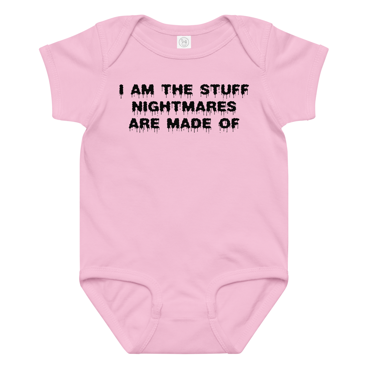 "I am the stuff nightmares are made of" printed on a pink baby jersey bodysuit laying on a flat surface amongst other clothes