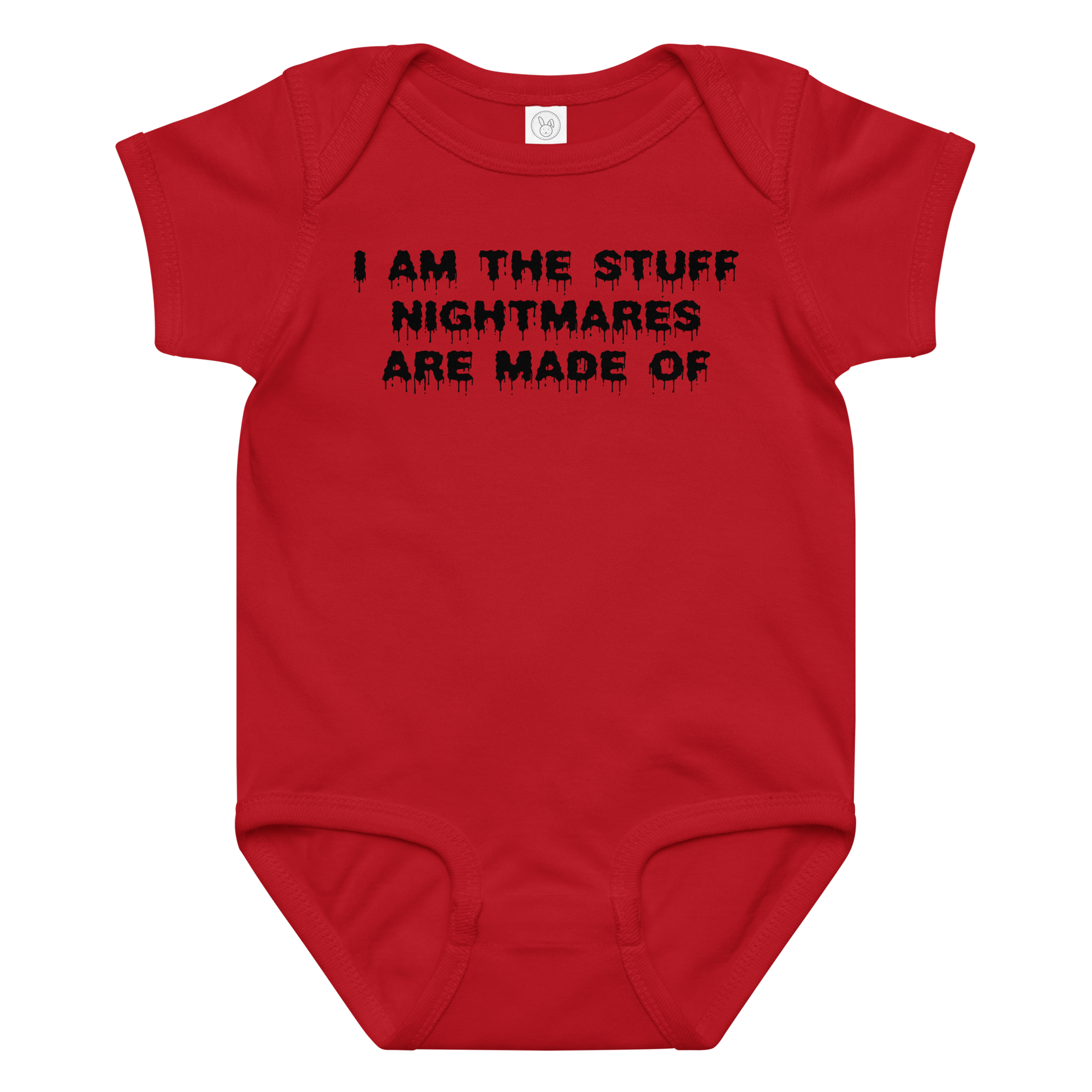 "I am the stuff nightmares are made of" printed on a red baby jersey bodysuit laying on a flat surface amongst other clothes