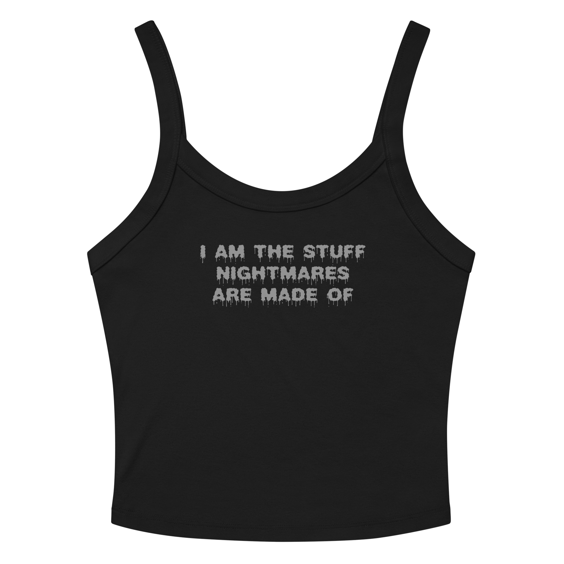 "I am the stuff nightmares are made of" printed on a solid black blend women's micro-rib tanktop laying on a flat surface amongst sunglasses and shorts