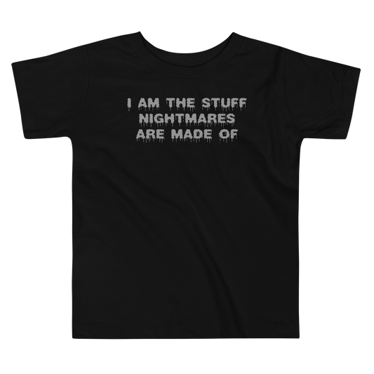 "I am the stuff nightmares are made of" printed on a black toddler short sleeve tee laying on a flat surface