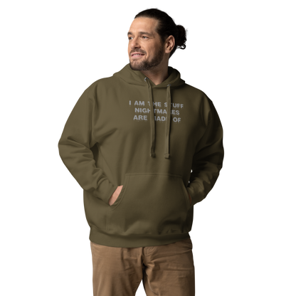 "I am the stuff nightmares are made of" printed on a military green unisex hoodie worn by a male