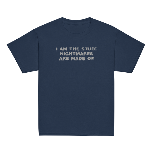 "I am the stuff nightmares are made of" printed on a navy youth classic tee laying on a flat surface