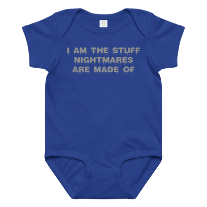 "I am the stuff nightmares are made of" printed on a royal baby jersey bodysuit laying on a flat surface amongst other clothes