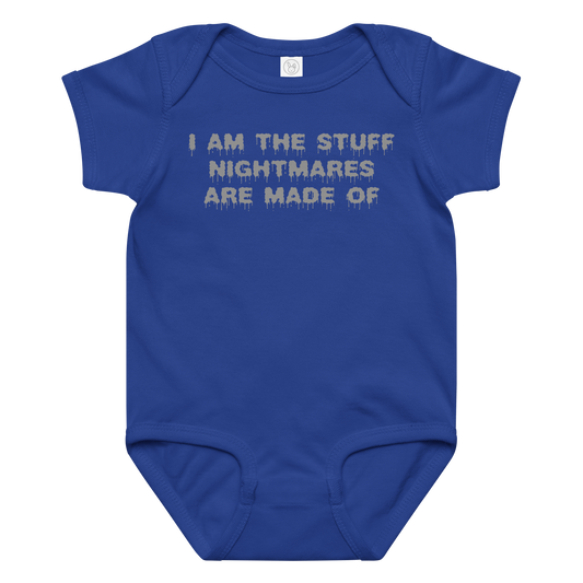 "I am the stuff nightmares are made of" printed on a royal baby jersey bodysuit laying on a flat surface amongst other clothes
