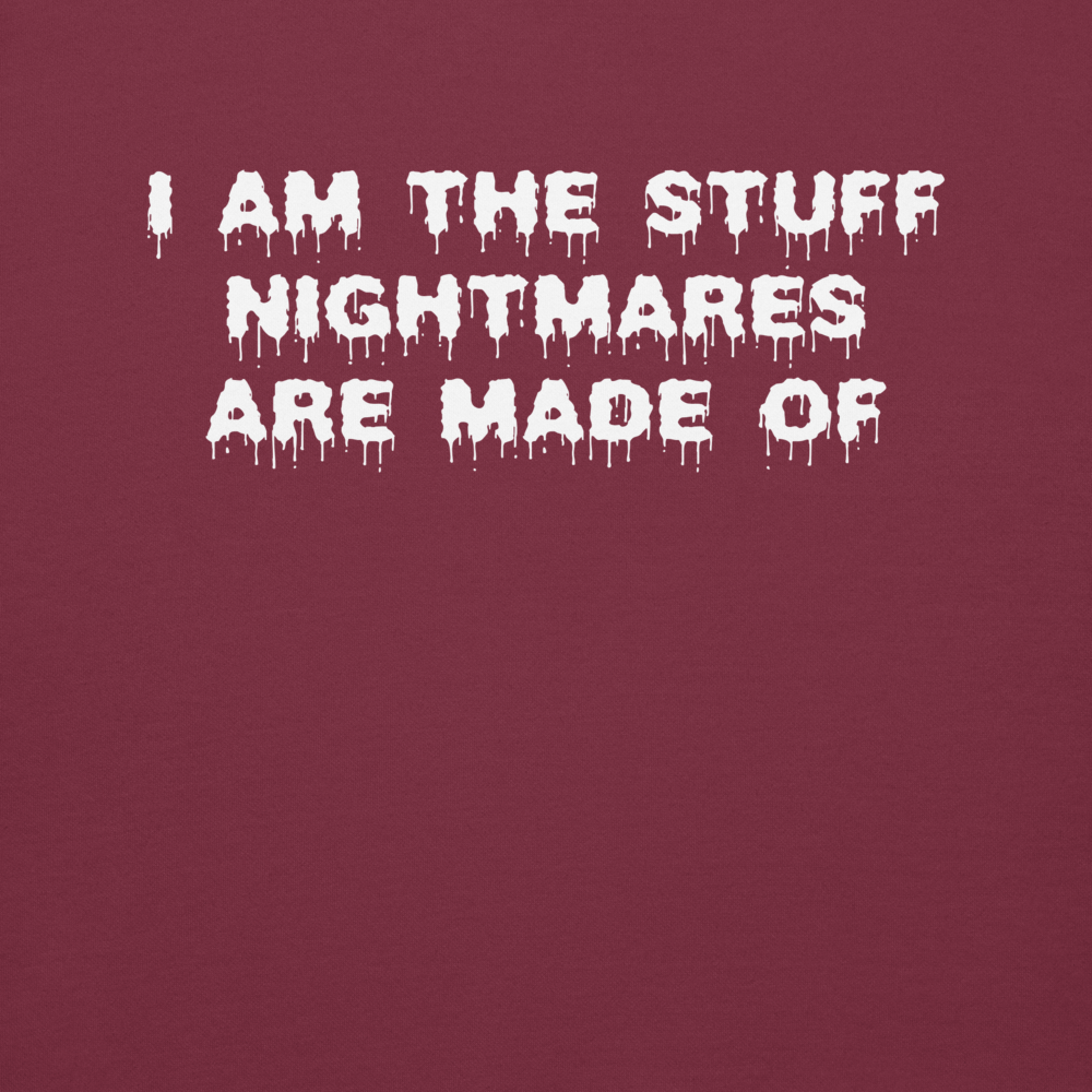 "I am the stuff nightmares are made of" printed on a maroon background