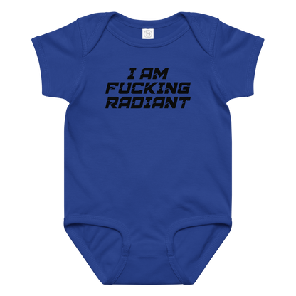 "I Am Fucking Radiant" printed on a royal baby jersey bodysuit laying on a flat surface amongst other clothes
