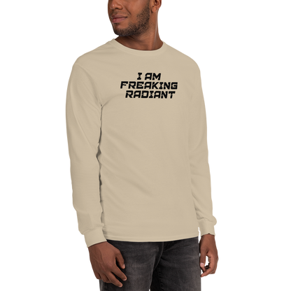"I Am Freaking Radiant" printed on a sand men's long sleeve shirt worn by a male