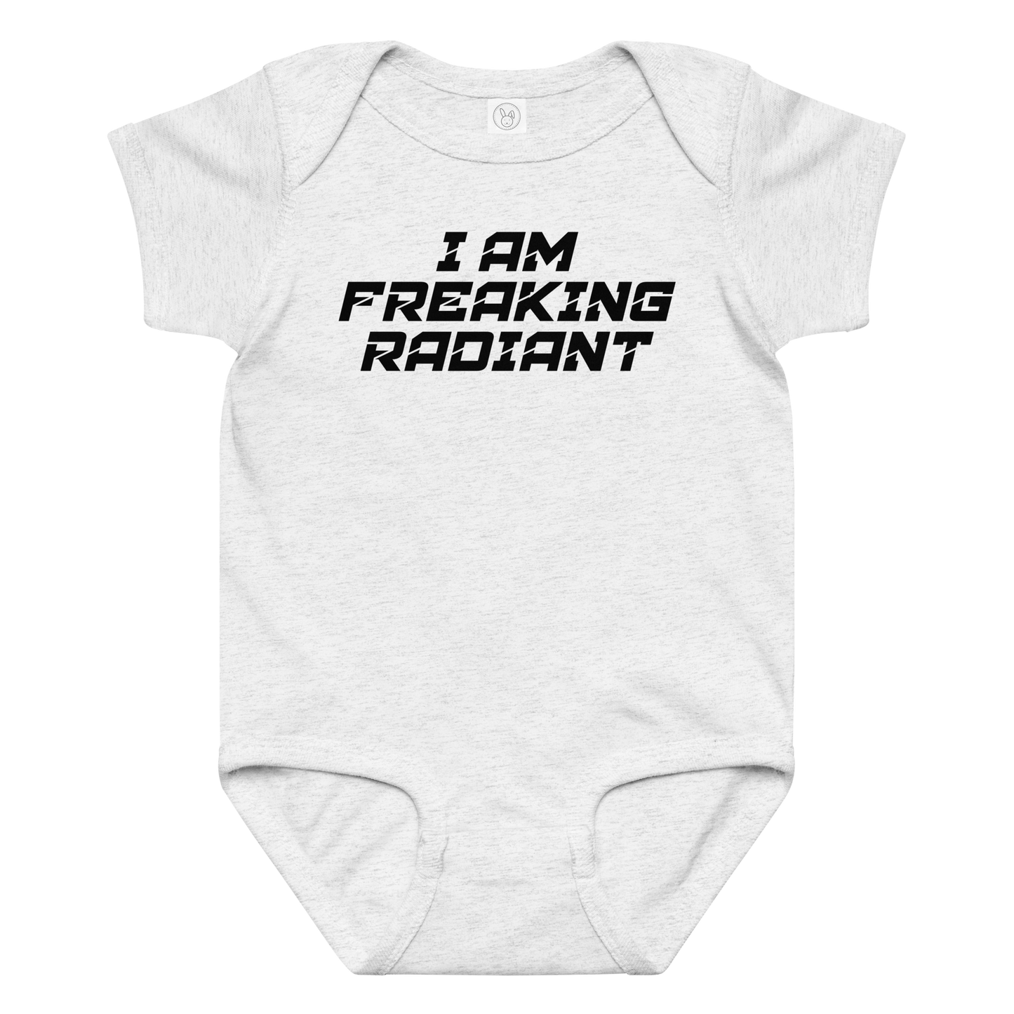 "I Am Freaking Radiant" printed on a ash baby jersey bodysuit laying on a flat surface amongst other clothes