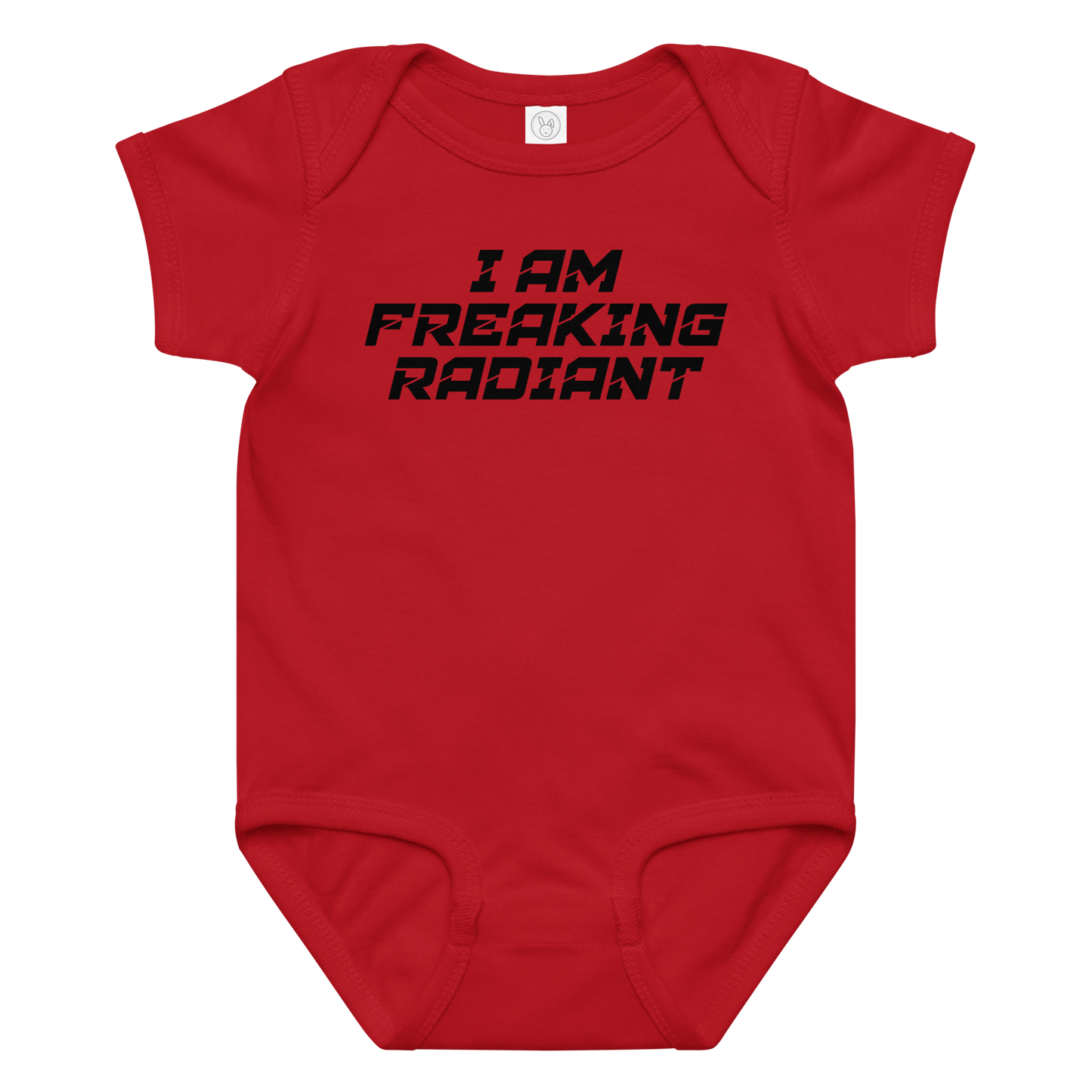 "I Am Freaking Radiant" printed on a red baby jersey bodysuit laying on a flat surface amongst other clothes