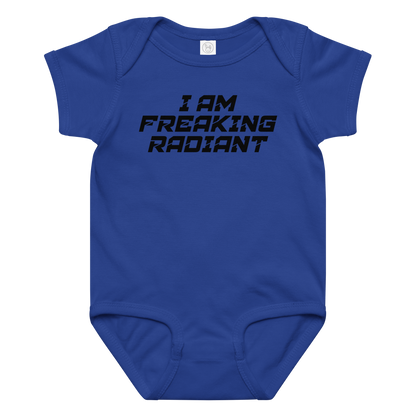 "I Am Freaking Radiant" printed on a royal baby jersey bodysuit laying on a flat surface amongst other clothes