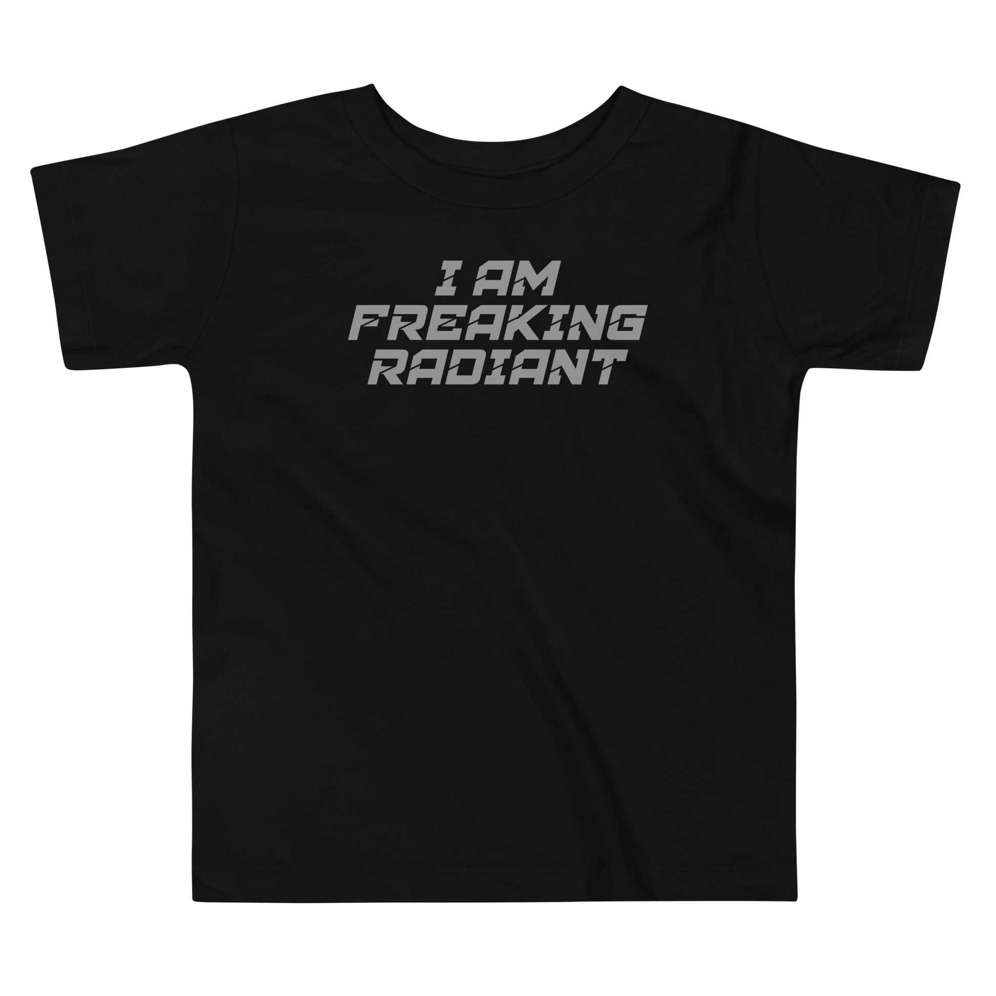 "I Am Freaking Radiant" printed on a black toddler short sleeve tee laying on a flat surface