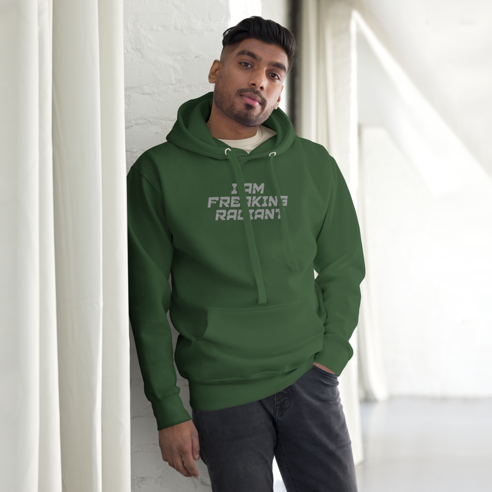 "I Am Freaking Radiant" printed on a forest green unisex hoodie worn by a male