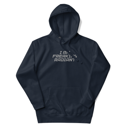 "I Am Freaking Radiant" printed on a navy blazer unisex hoodie laying on a flat surface with the hood up