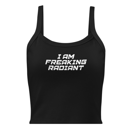"I Am Freaking Radiant" printed on a solid black blend women's micro-rib tanktop laying on a flat surface