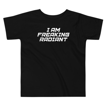 "I Am Freaking Radiant" printed on a black toddler short sleeve tee laying on a flat surface