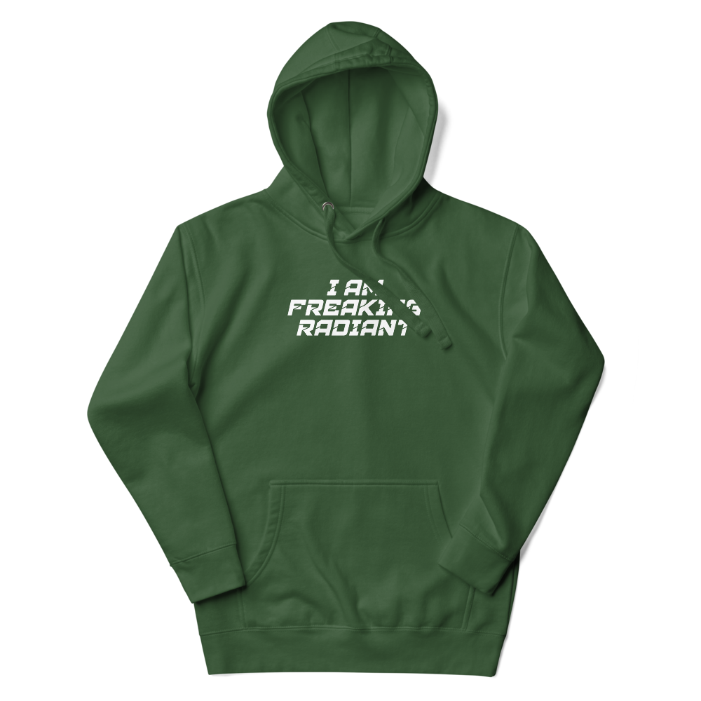 "I Am Freaking Radiant" printed on a forest green unisex hoodie laying on a flat surface with the hood up