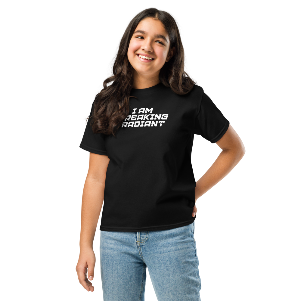 "I Am Freaking Radiant" printed on a black youth classic tee worn by a female