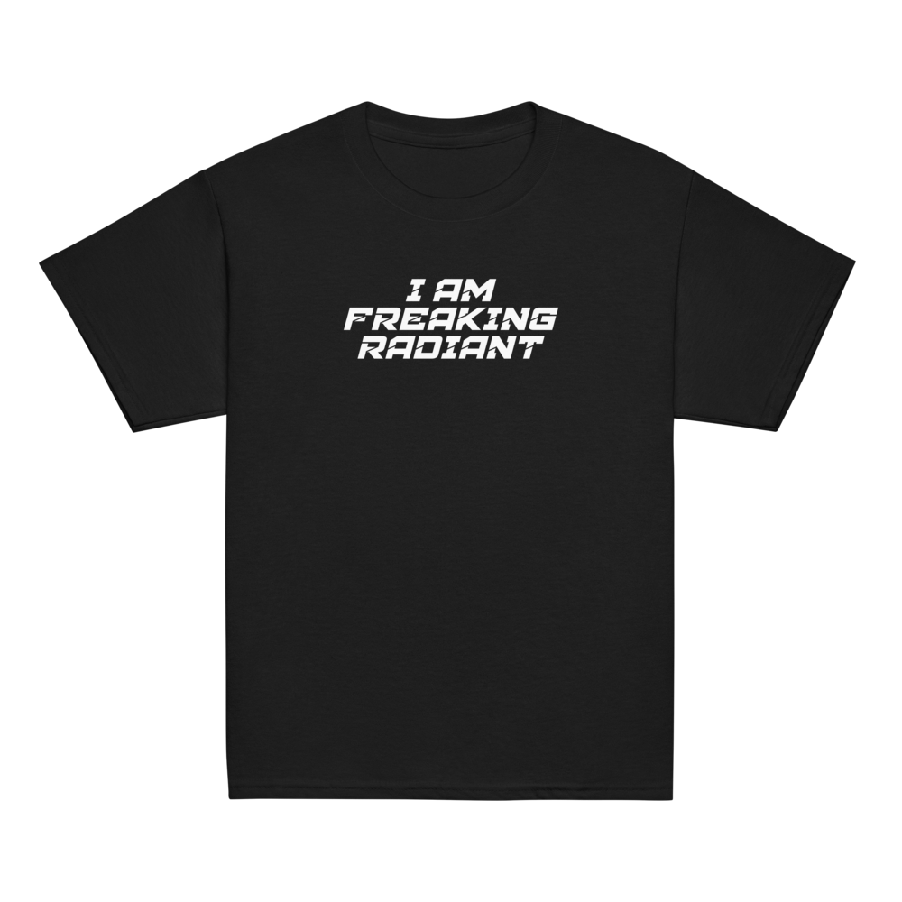 "I Am Freaking Radiant" printed on a black youth classic tee laying on a flat surface