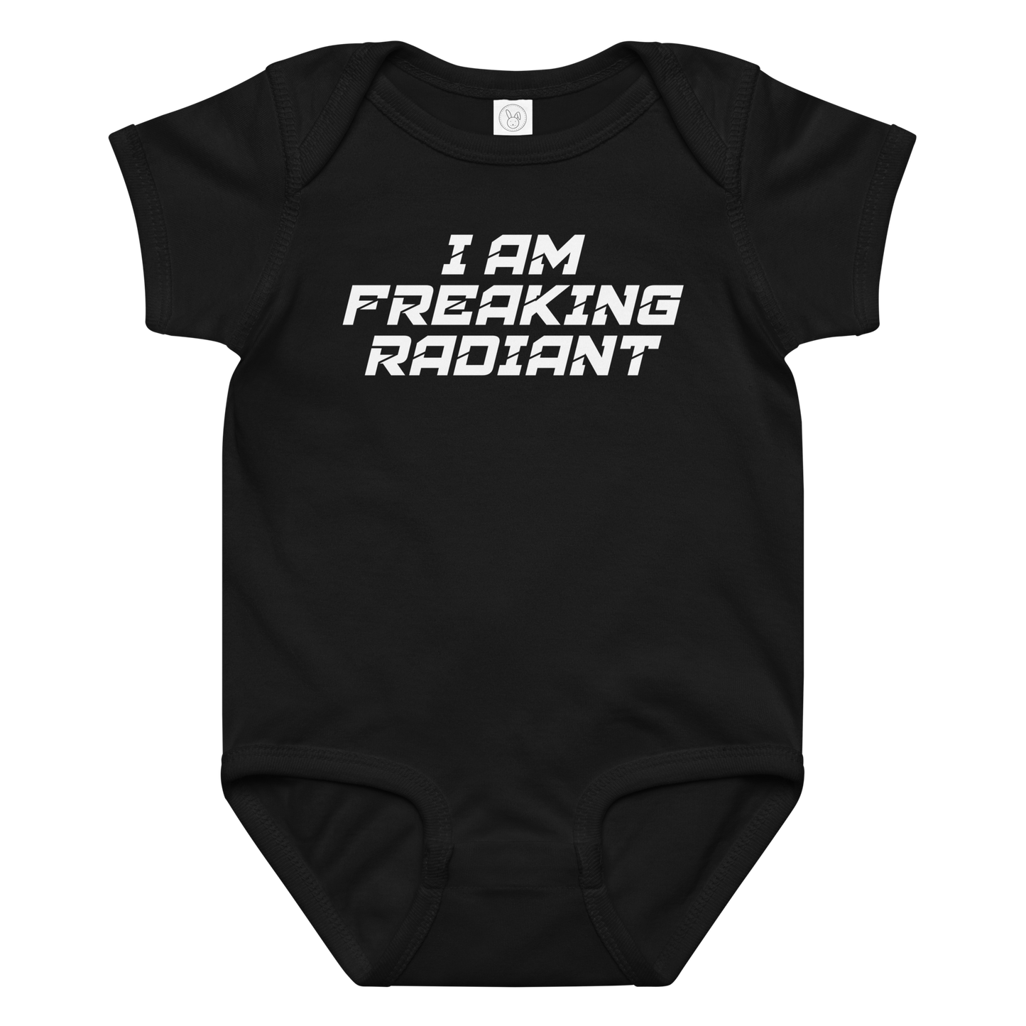"I Am Freaking Radiant" printed on a black baby jersey bodysuit laying on a flat surface amongst other clothes