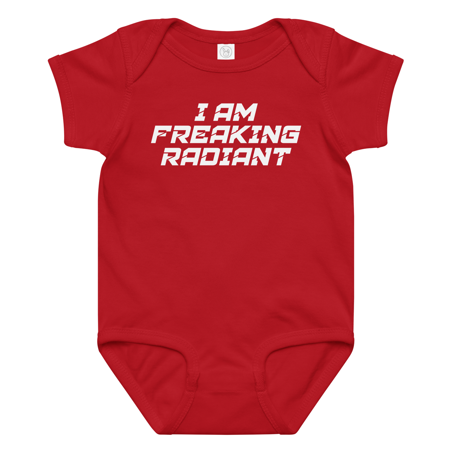 "I Am Freaking Radiant" printed on a red baby jersey bodysuit laying on a flat surface amongst other clothes