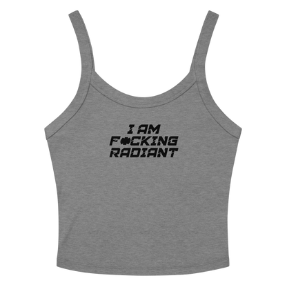 "I Am F*cking Radiant" printed on a athletic heather women's micro-rib tanktop laying on a flat surface amongst sunglasses and shorts
