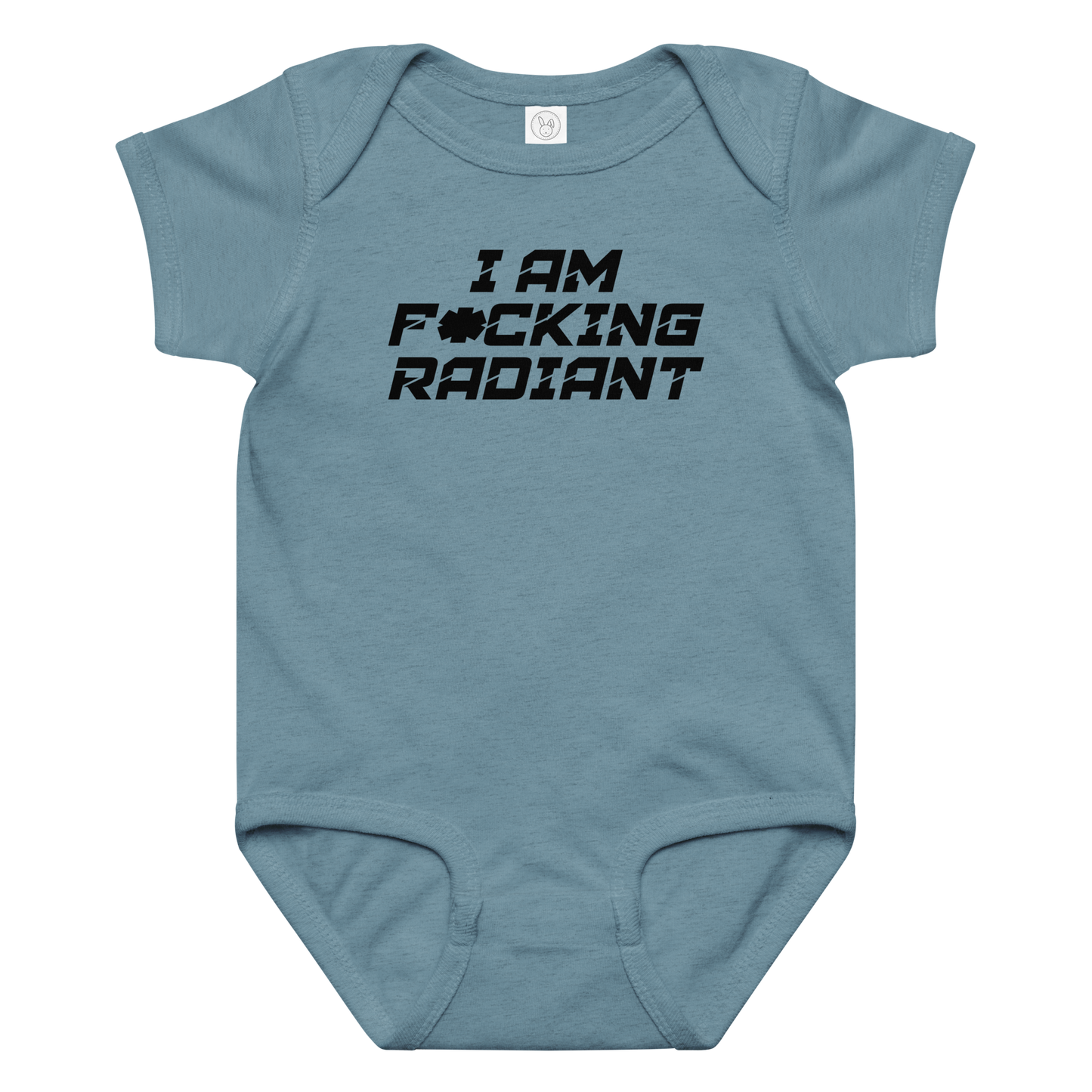"I Am F*cking Radiant" printed on a vintage indigo baby jersey bodysuit laying on a flat surface amongst other clothes