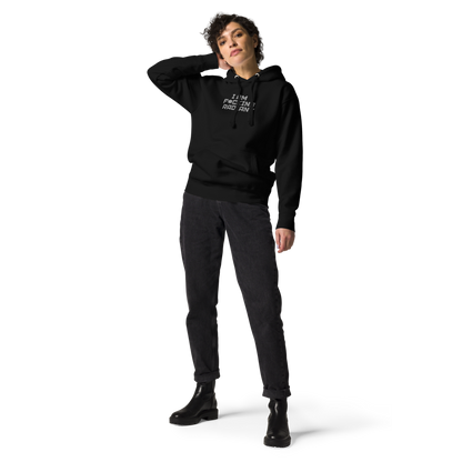 "I Am F*cking Radiant" printed on a black unisex hoodie worn by a female