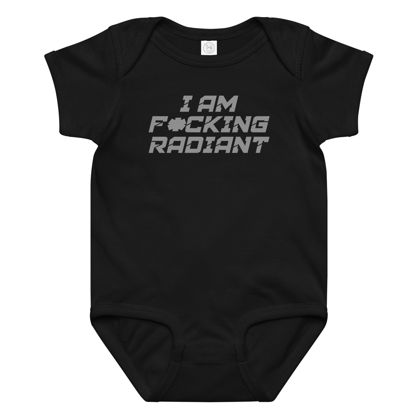 "I Am F*cking Radiant" printed on a black baby jersey bodysuit laying on a flat surface amongst other clothes