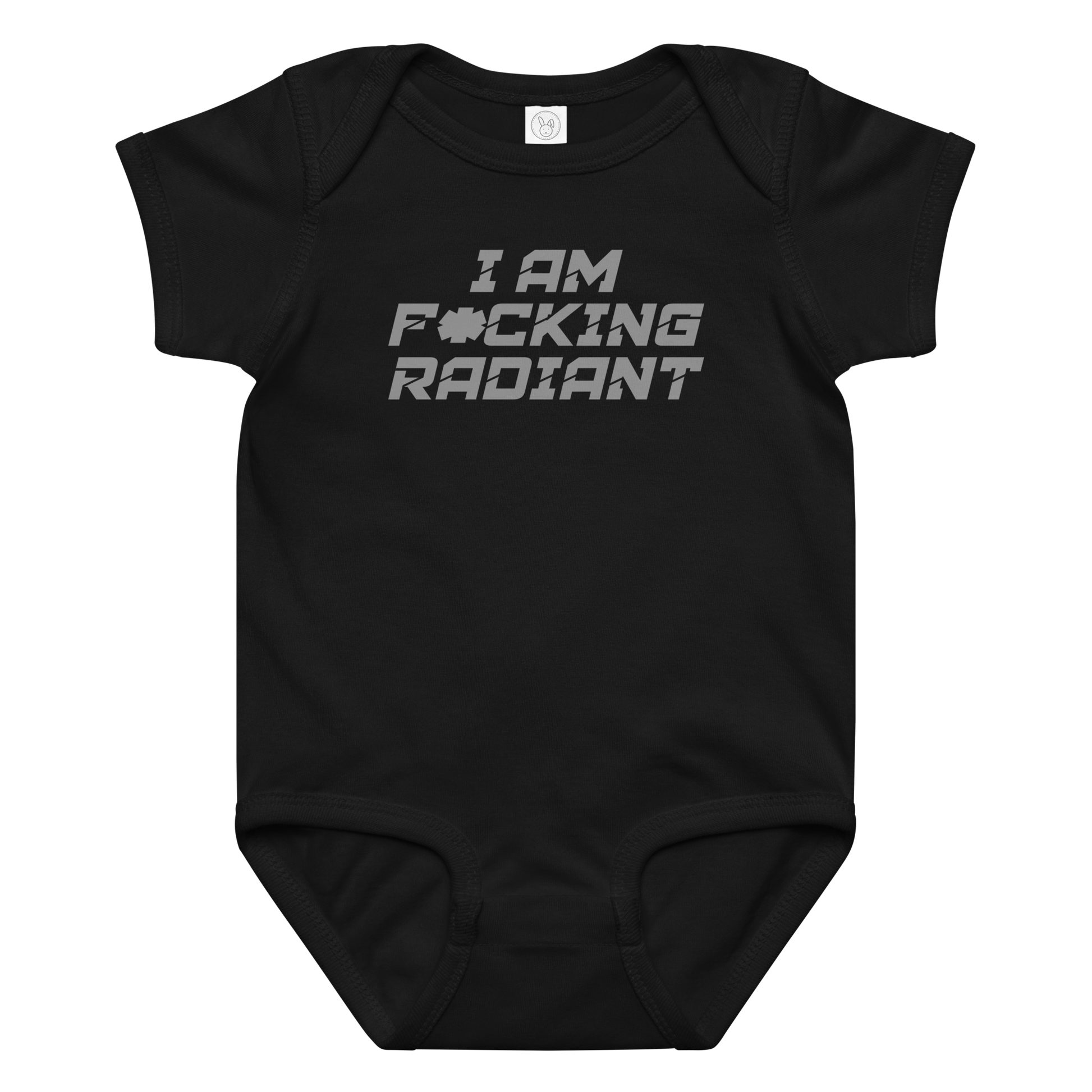 "I Am F*cking Radiant" printed on a black baby jersey bodysuit laying on a flat surface amongst other clothes