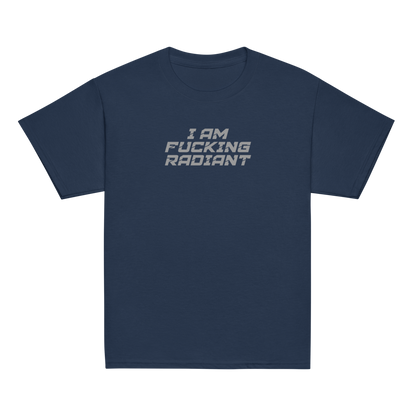 "I Am Fucking Radiant" printed on a navy youth classic tee laying on a flat surface