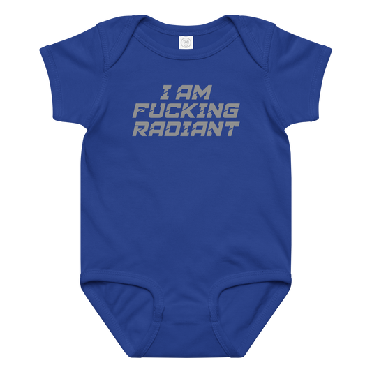 "I Am Fucking Radiant" printed on a royal baby jersey bodysuit laying on a flat surface amongst other clothes
