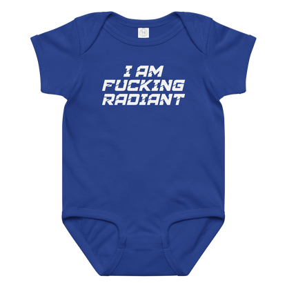 "I Am Fucking Radiant" printed on a royal baby jersey bodysuit laying on a flat surface amongst other clothes